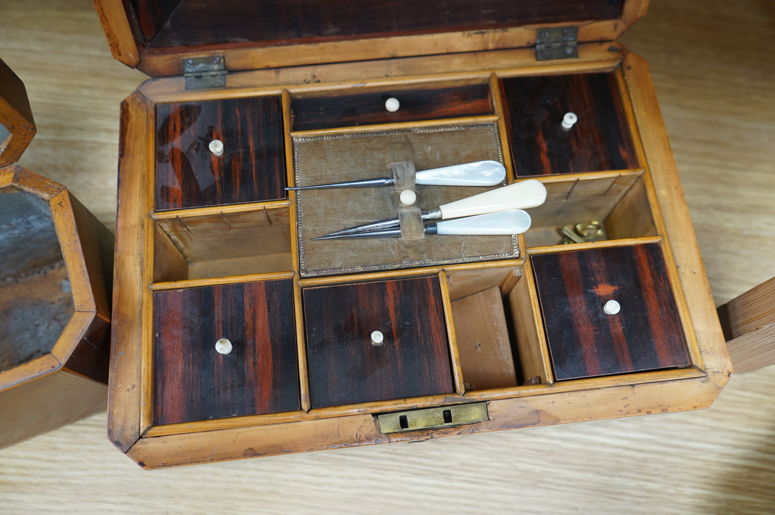 A 19th century mahogany work box and two tea caddies, largest work box 29cm wide, 20cm deep (3). Condition - poor to fair